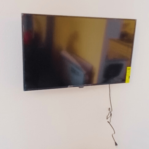 Flat screen TV mounted on the wall